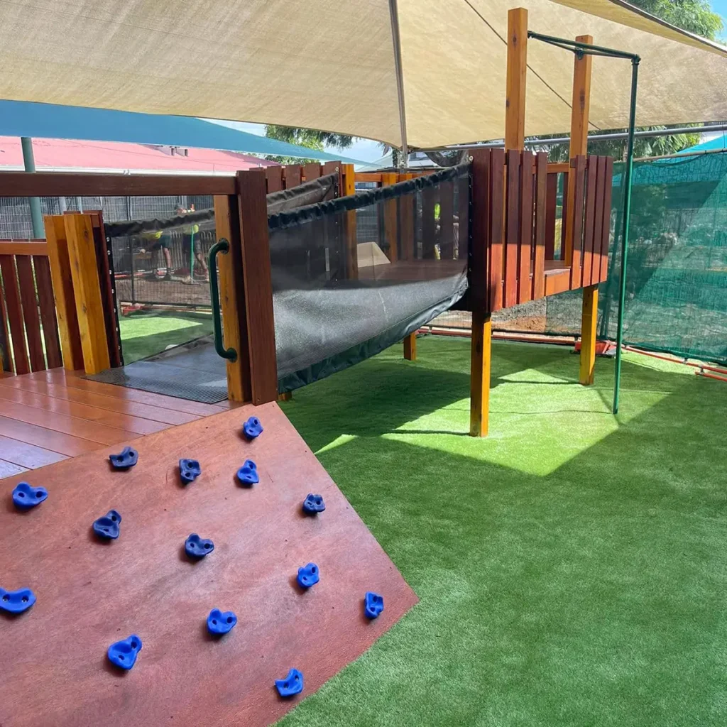 Rock climbing wall on playground equipment
