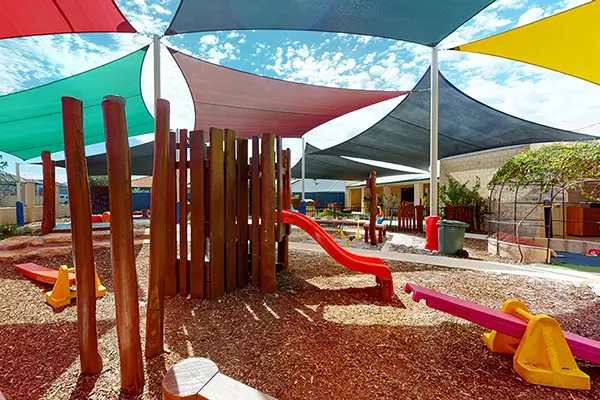 Wooden playground equipment with slide