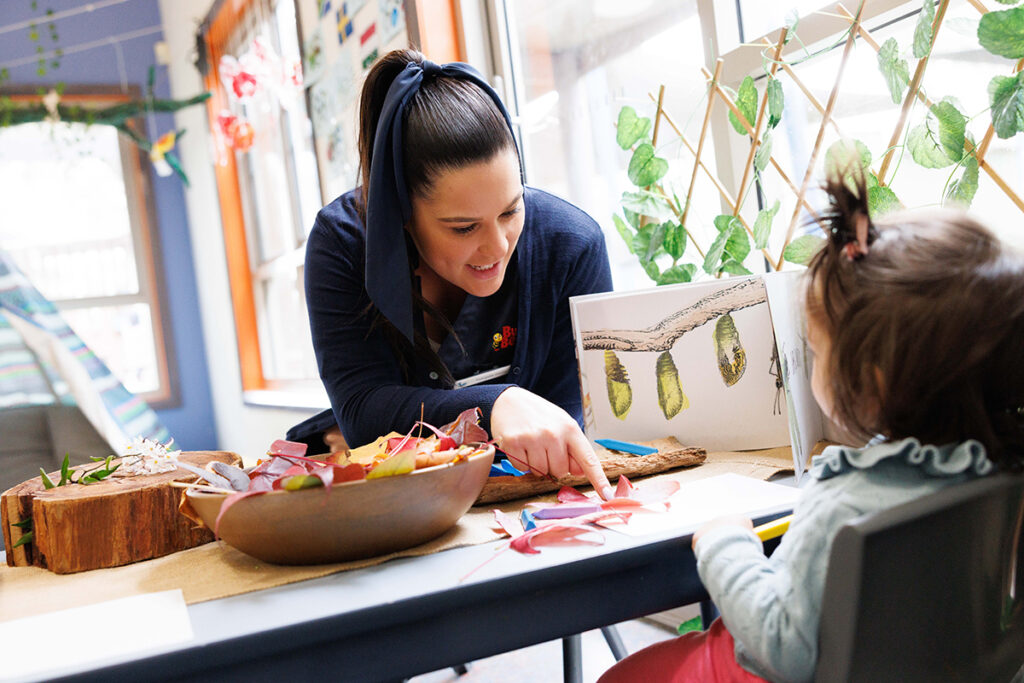 Busy Bees Early Childhood Educator teaching child