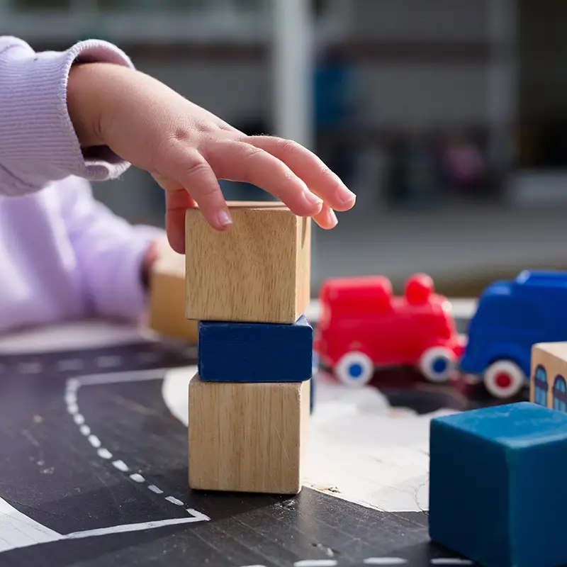 Child playing with toys at Wellard childcare