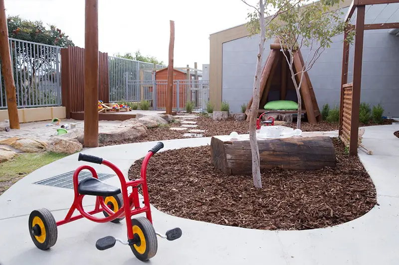 tricycle in outdoor playground at Wellard childcare