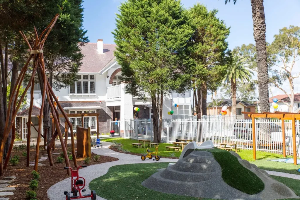 Outdoor playground with bike track at Lane Cove daycare and preschool