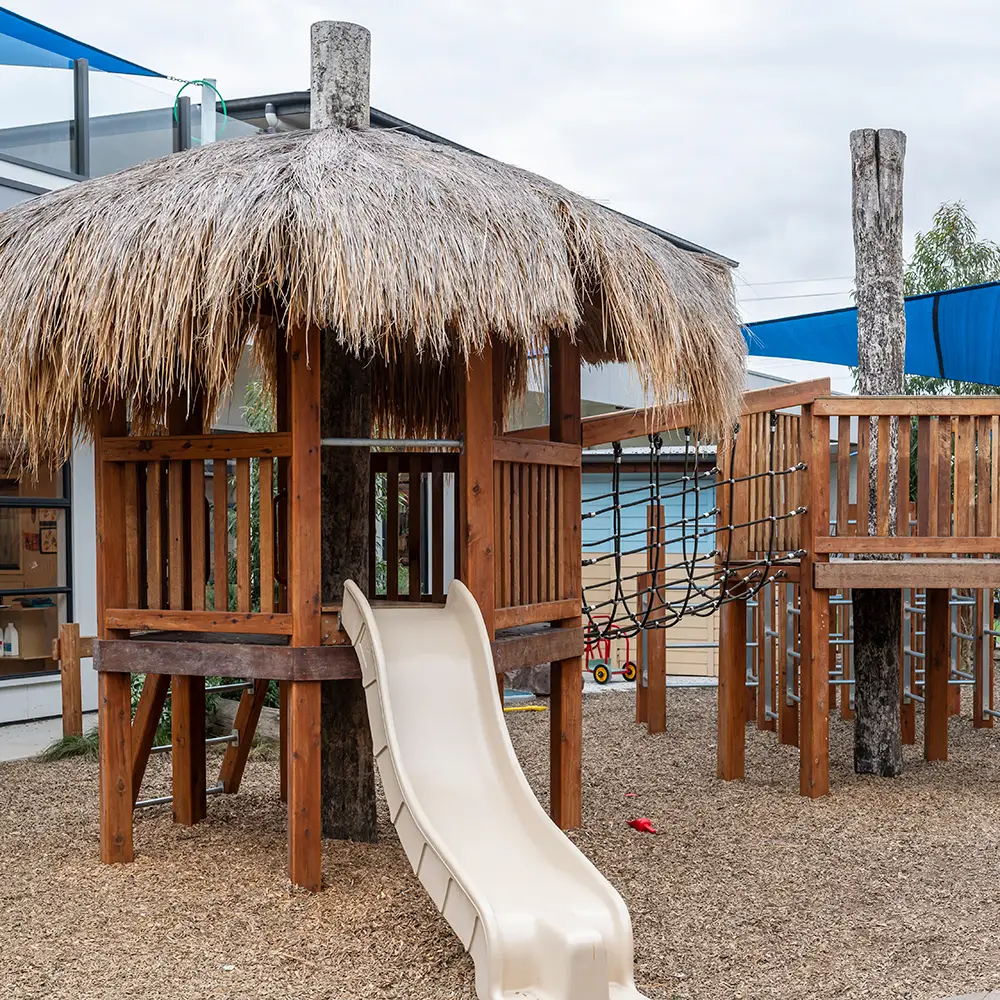 Wooden playground with slide