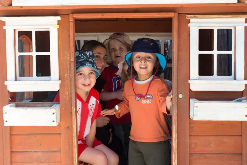 Kindy children in cubby house