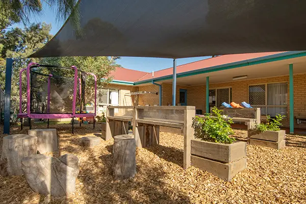 Outdoor playground with trampoline at Busy Bees at Gilles Plains