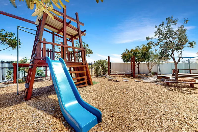 Yanchep kindergarten outside playground with fort and slide