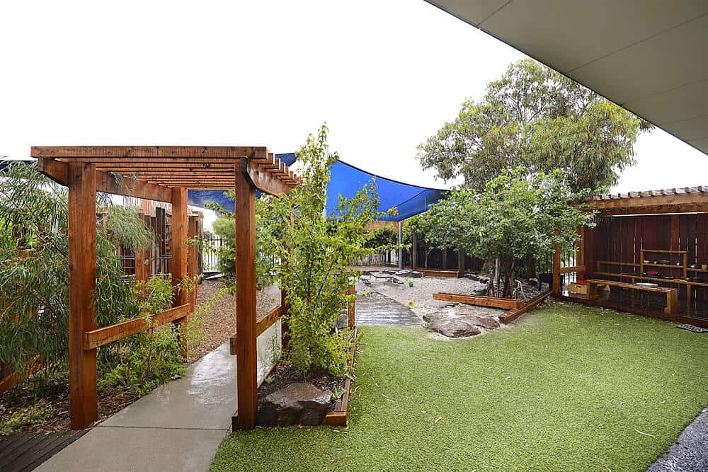 Playground with sandpit and archway at Cranbourne North child care