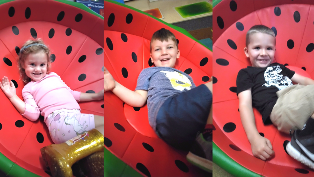 Children playing on watermelon discs