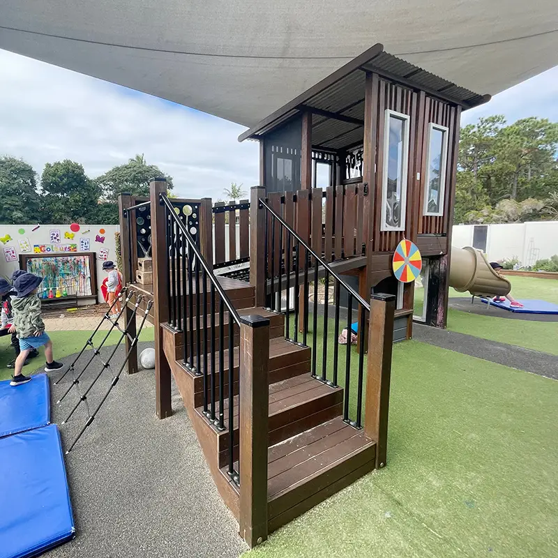 Timber fort in the outdoor shaded playground at Busy Bees at Mermaid Waters
