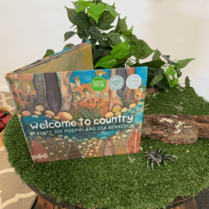 'Welcome to country' book on top of table