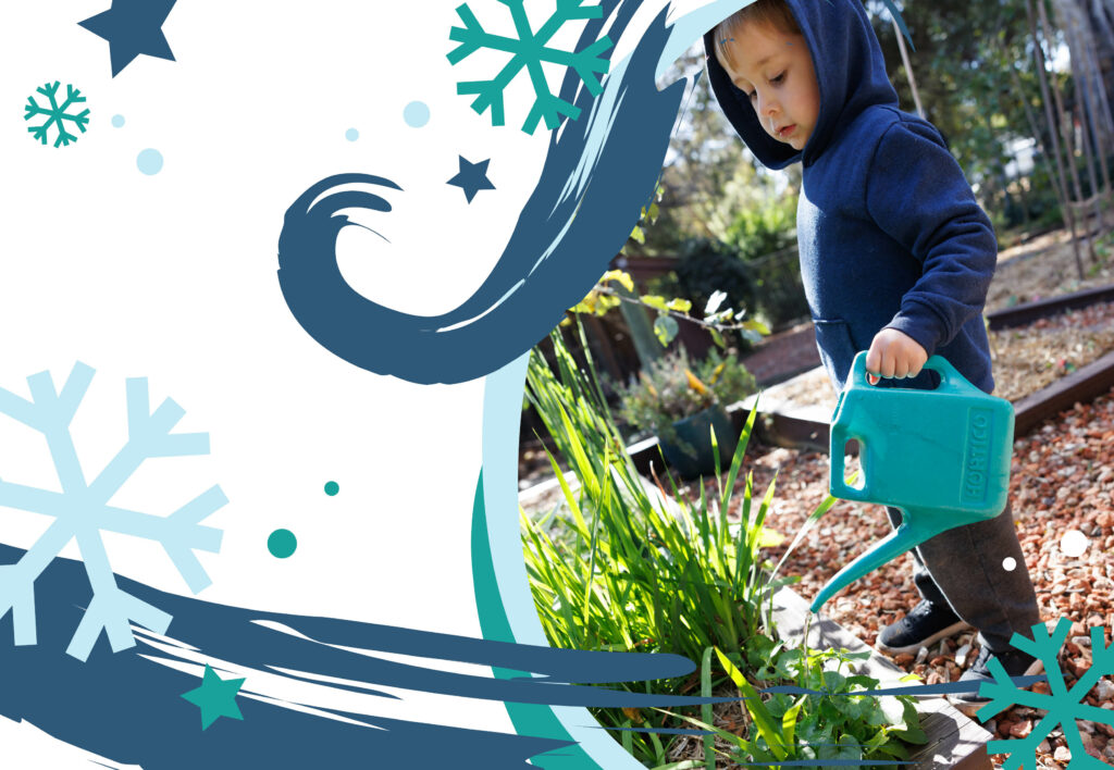 Child watering a vegetable garden