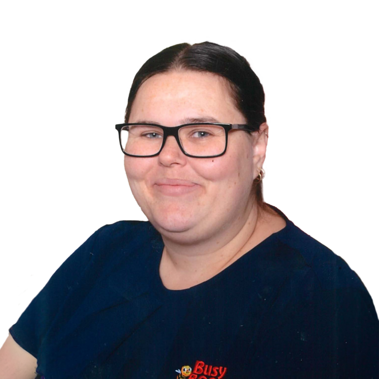 Rebecca, Manager of Busy Bees Beenleigh wearing a navy top with a logo that reads "Busy Bees".