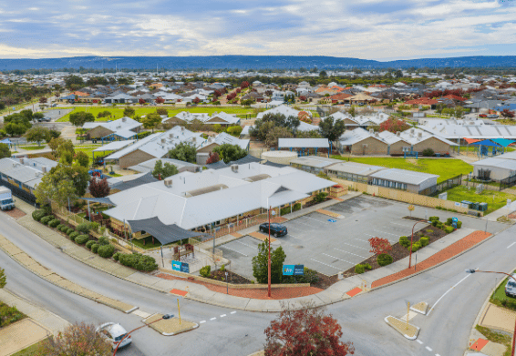 Aerial view of the centre building and outdoor learning environments.