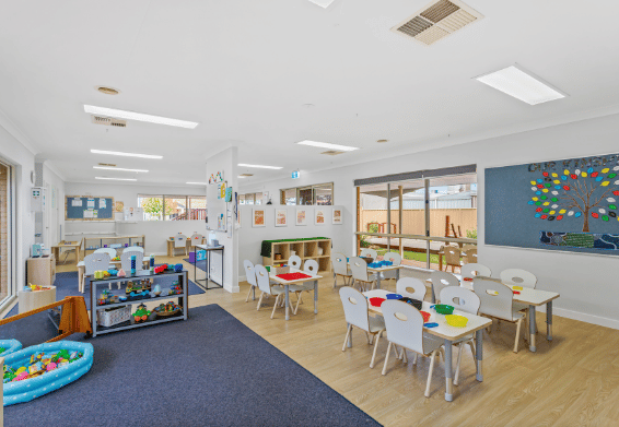 Early learning classroom with play areas and educational resources.