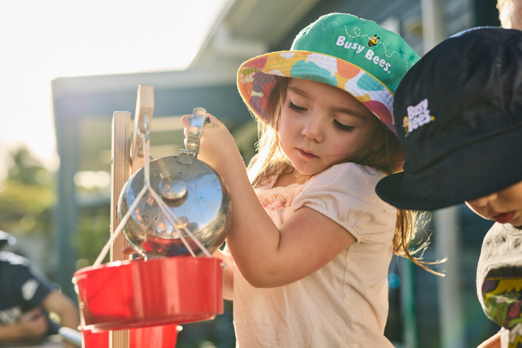 Child participating in a hands-on learning activity.