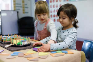 two toddler girls at childcare
