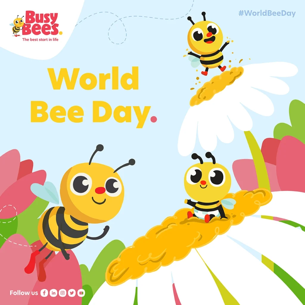Illustration of two bees collecting pollen from flowers with the text "World Bee Day" and "Busy Bees" logo in the upper left corner.