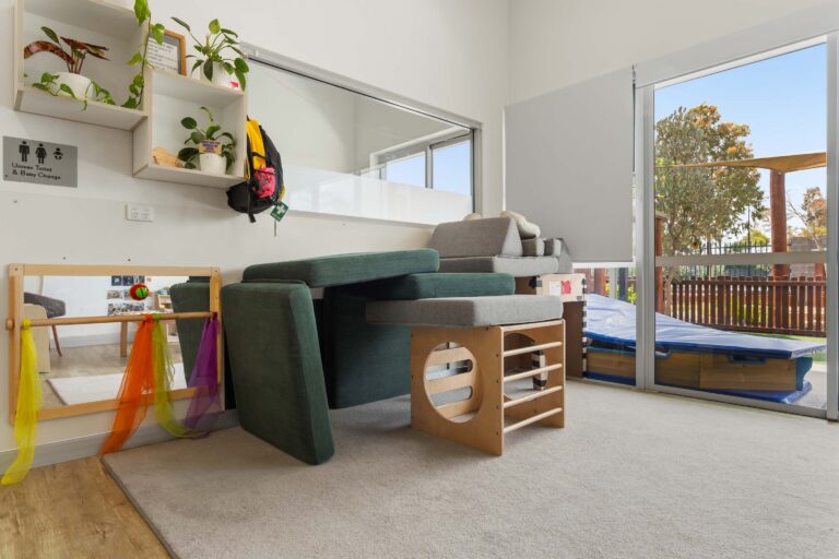Nursery at Busy Bees Banksia Grove Village with soft play blocks, a climbing cube and doors to the garden